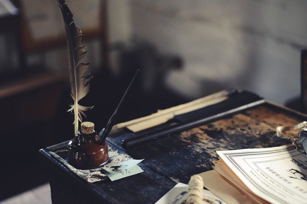 desk, ink, feather-1869579.jpg